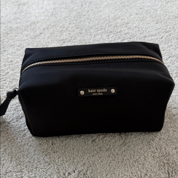 kate spade Accessories - kate spade black nylon cosmetic case with gold zipper